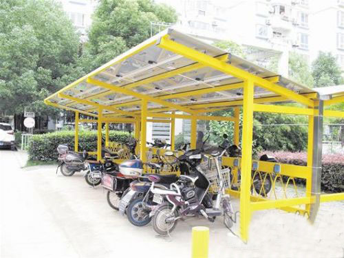 武汉江城首个光伏电动车棚亮相 居民可免费为电动车充电